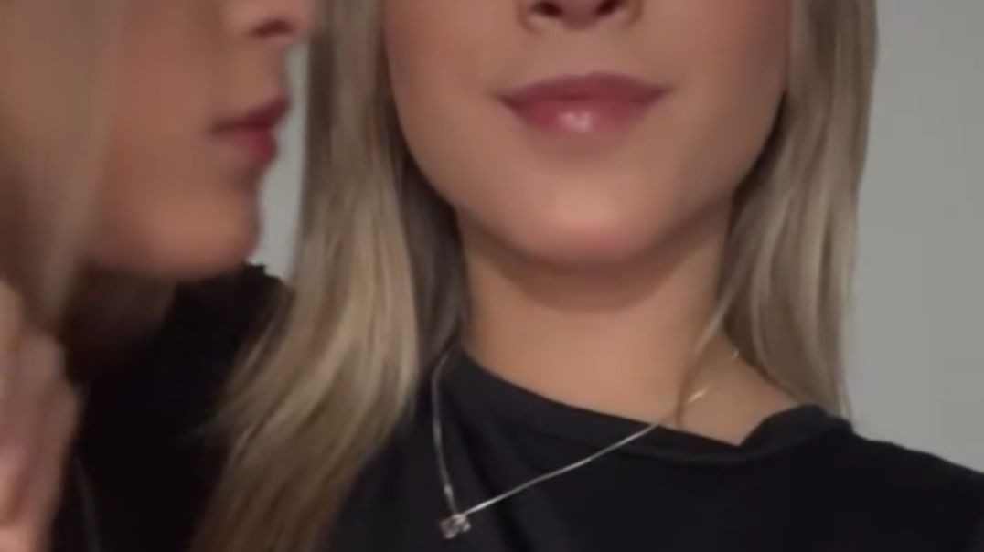 The Twins almost kiss